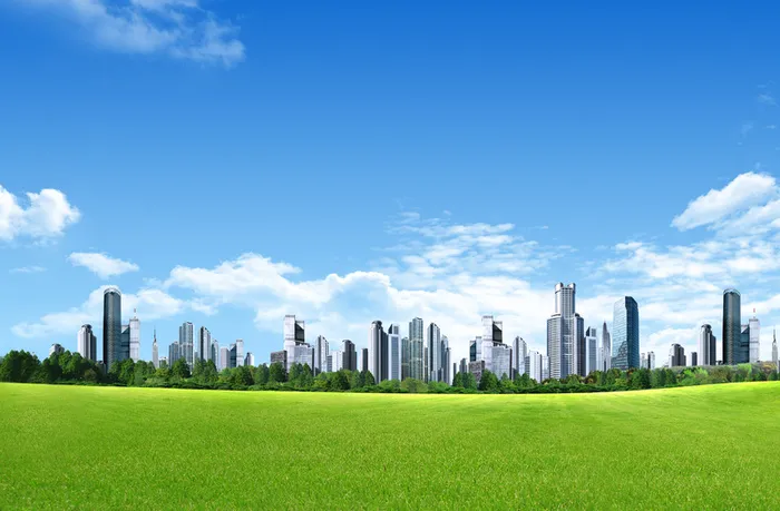 蓝天白云草地城市建筑背景素材高清
