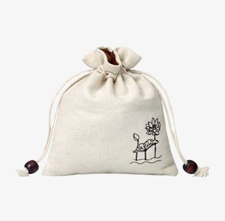 纯白色荷花收口炭包袋免抠