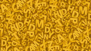 黄色字母堆积高清