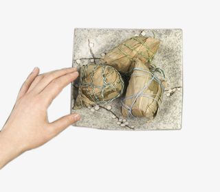 创意手拿粽子免抠