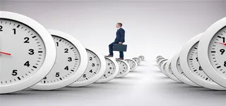 站在时钟的商务男人科技背景高清