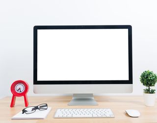 盆栽与空白显示的电脑屏幕高清