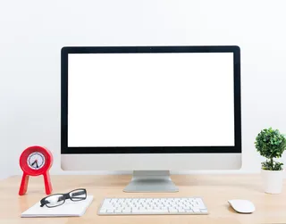 盆栽与空白显示的电脑屏幕高清