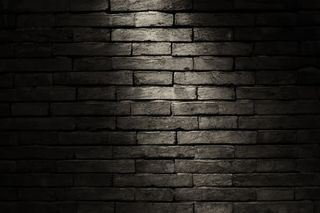 黑色砖墙海报背景