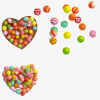 心型盒子里的五彩缤纷的糖果豆免抠