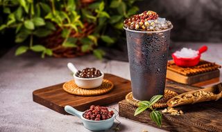 奶茶背景摄影图