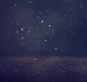 深蓝光斑粒子背景