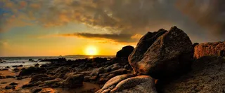 大气黄昏秋季海边礁石背景高清