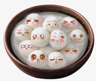 黑红色碗里的可爱卡通糯米圆子免抠