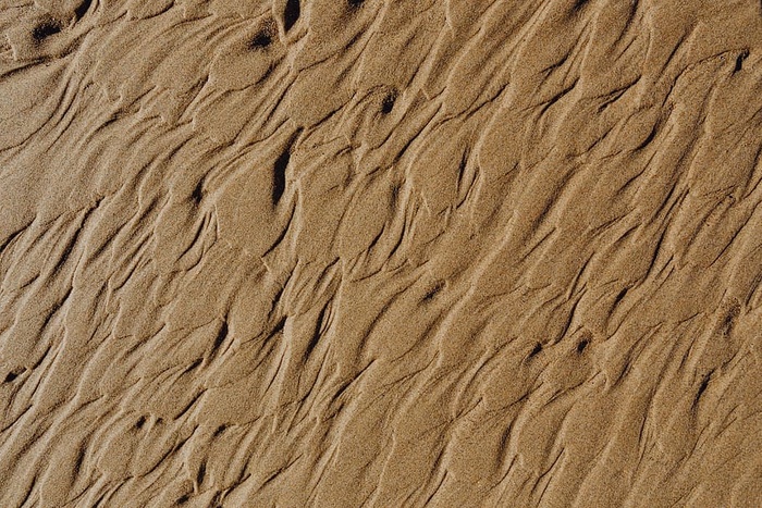 抽象线条由水上砂纹理设计而成