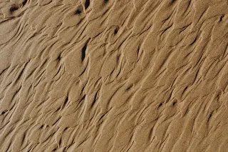 抽象线条由水上砂纹理设计而成