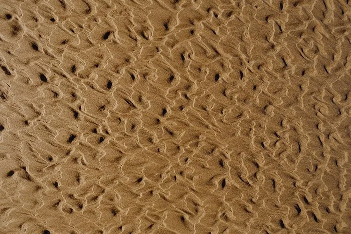 抽象线条由水上砂纹理设计而成