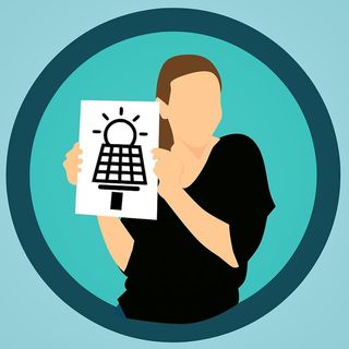 举着太阳能标志的人的图示。