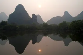 china, yangshuo, guilin, river, sunset, sun, fog, mountains