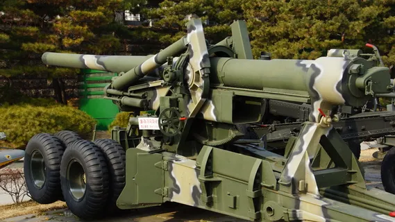 武器,大炮,榴弹炮,拖车运动,武器,军事,战斗,一天 武器,大炮,榴弹炮,拖车运动,武器,军事,战斗,一天