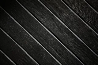 黑色木材角纹理照片
