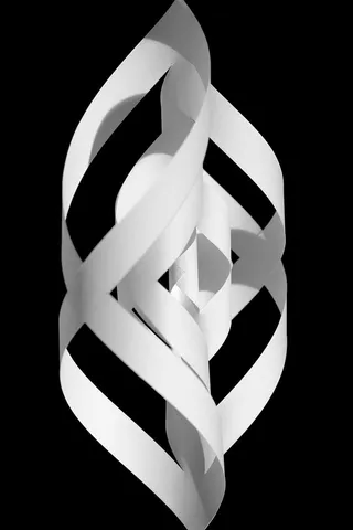 纸，纸人物，漩涡，修补匠，艺术，黑色背景，工作室拍摄，特写