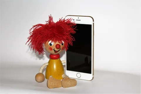pumuckl，iphone 6s，智能手机，可爱，无人，工作室拍摄，室内，红色