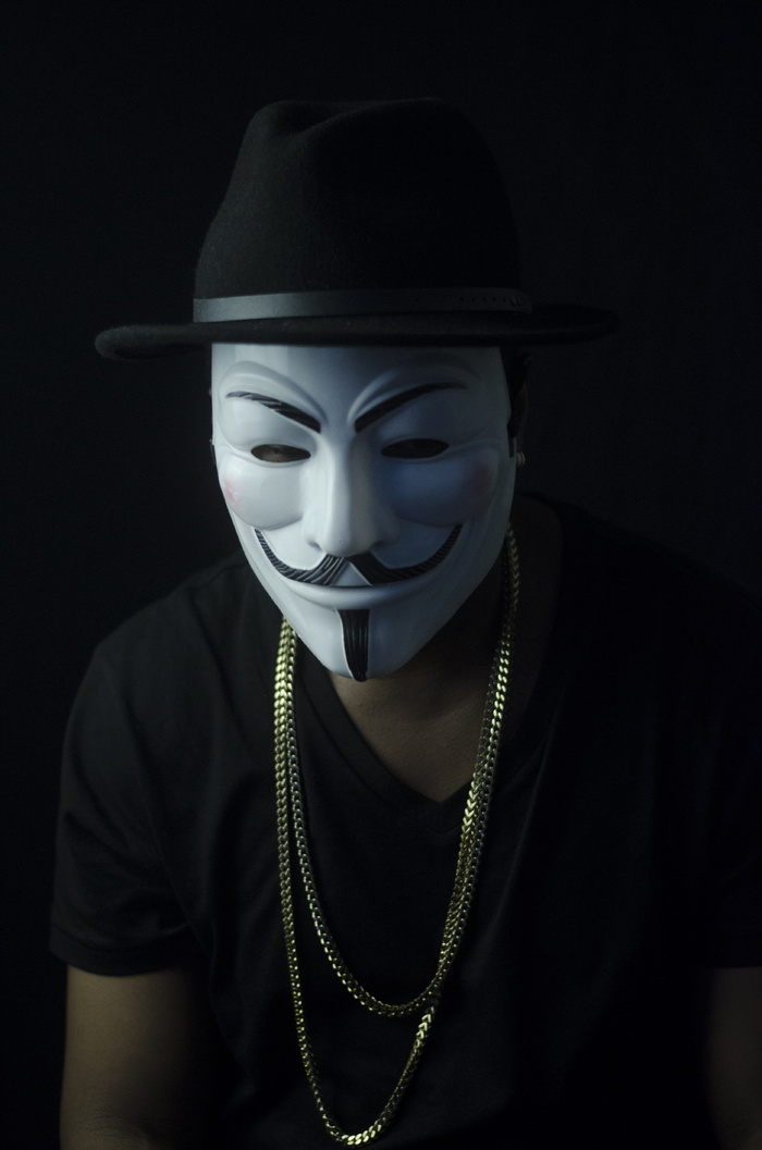 戴盖伊·福克斯面具的男子照片