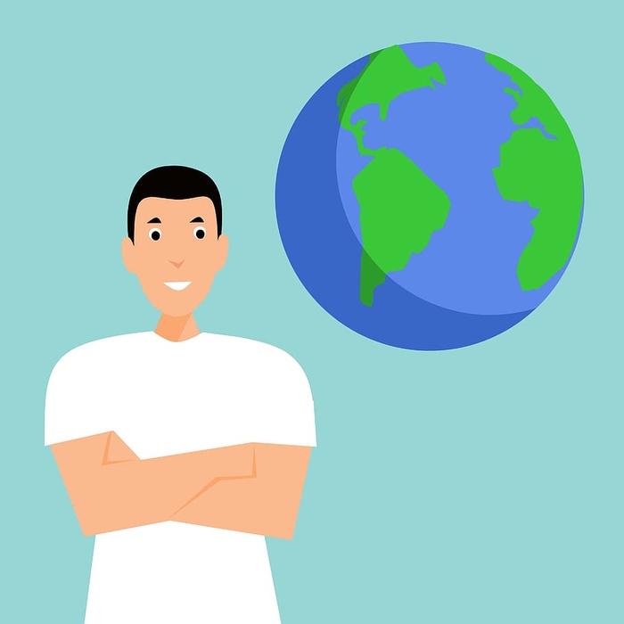 站在地球图解附近的人。