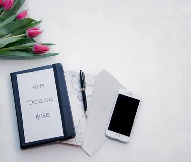 银色Iphone 6配黑色旋转笔