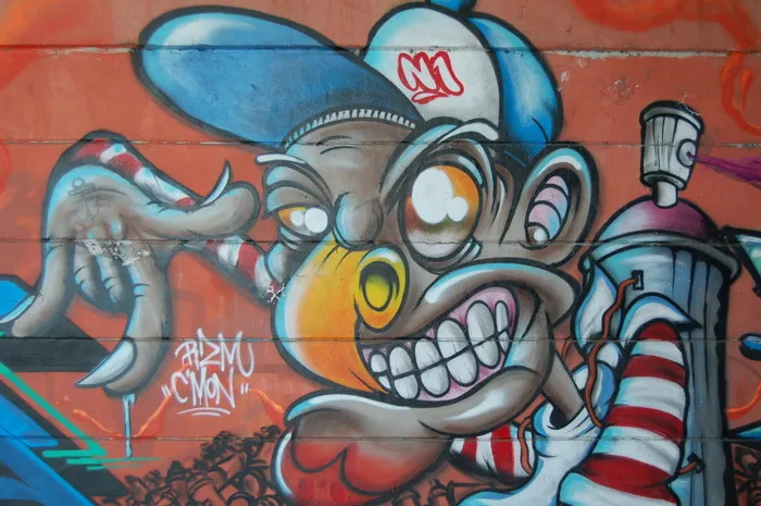 一幅非裔美国人涂鸦的讽刺壁画。