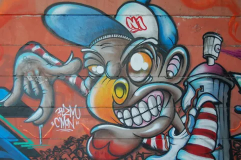 一幅非裔美国人涂鸦的讽刺壁画。