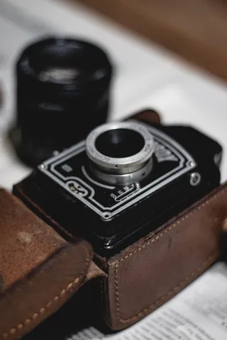 电子产品，相机，相机镜头，数码相机，表带，镜头盖，摄像机，拉链