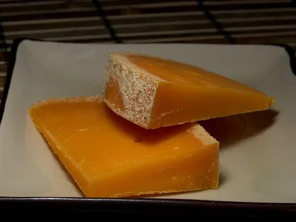 Mimolete奶酪,乳制品,食品,配料,食用,零食,美味,脂肪 Mimolete奶酪,乳制品,食品,配料,食用,零食,美味,脂肪