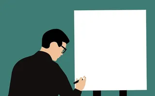 男子在大报告纸的黑纸上书写的插图。