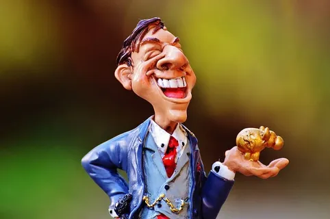 男人,控股,金猪雕像,商人,股票经纪人,金钱,利润,金融 男人,控股,金猪雕像,商人,股票经纪人,金钱,利润,金融