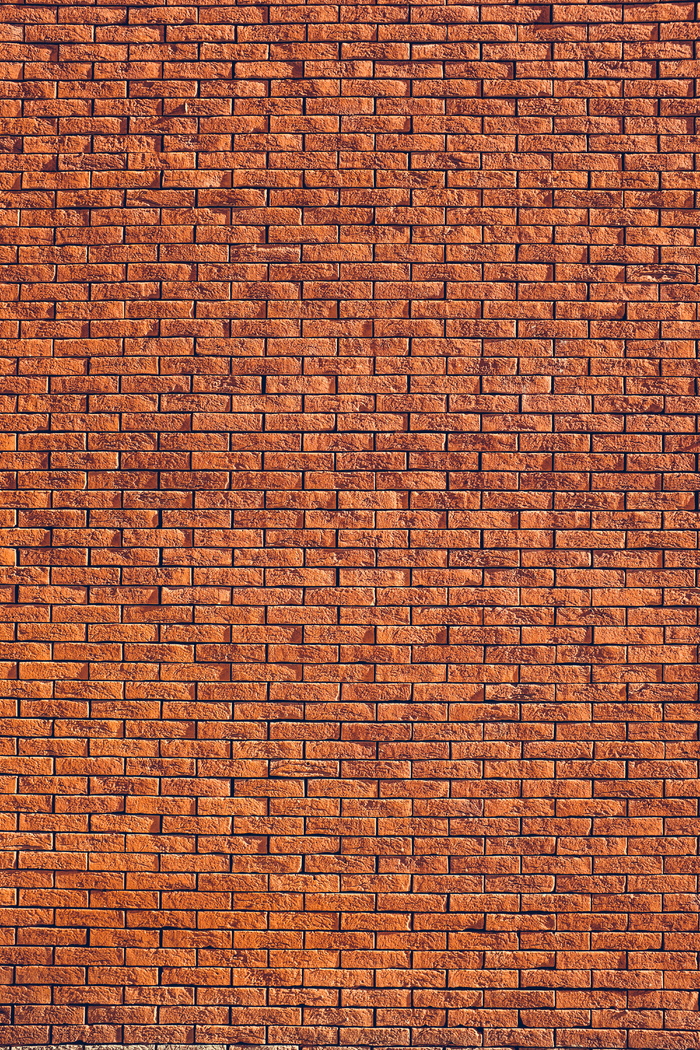 棕色墙面包层，棕色混凝土砖，砖，墙，图案，阳光，阴影，纹理