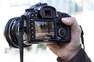 相机，佳能，数码单反，摄影，产品，实时显示，手，实物模型