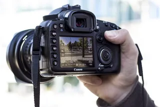 相机，佳能，数码单反，摄影，产品，实时显示，手，实物模型