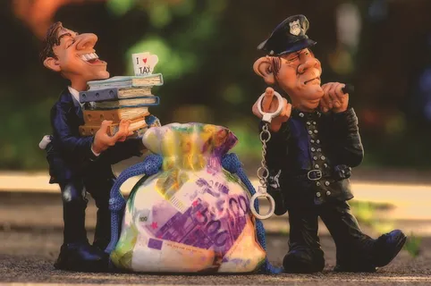 税收、逃税、警察、手铐、诈骗、税务顾问、金融、金钱