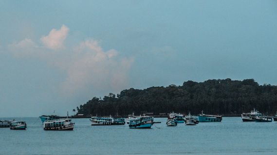 Teal Boats Near Island