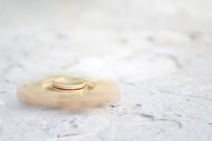 旋转坐立不安的旋转器，旋转坐立不安的旋转器，旋转器，小坐立不安的旋转器，运动，选择性聚焦，没有人