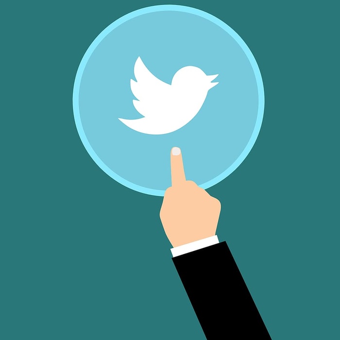 向Twitter伸出手的图示。