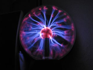 星云球，带电，圆形，几何形状，蓝色，黑色背景，室内