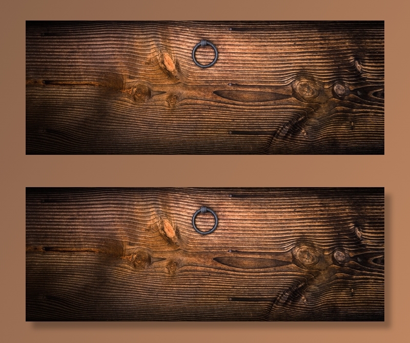 木质面板上的灰色金属门环