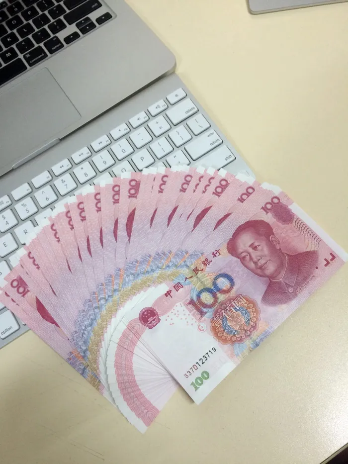 喜欢中国百元钞票的Macbook
