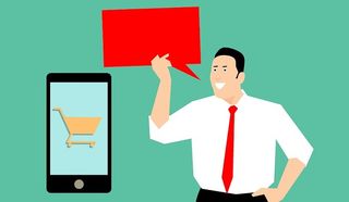 营销人员谈论使用移动设备进行社交媒体营销。购物卡和空的语音泡泡。