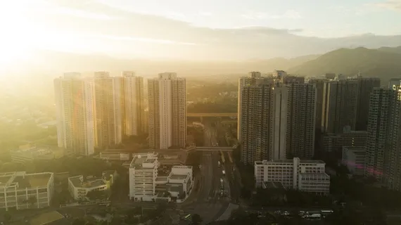 香港,天水围,太阳,阳光,早晨,摩天大楼,灯火,薄雾 香港,天水围,太阳,阳光,早晨,摩天大楼,灯火,薄雾