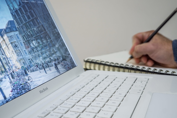 Man White MacBook