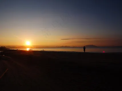 三亚海滩日出图片