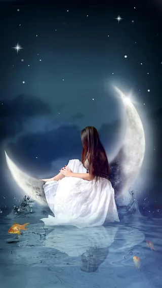 坐在月亮上的美女高清摄影图片