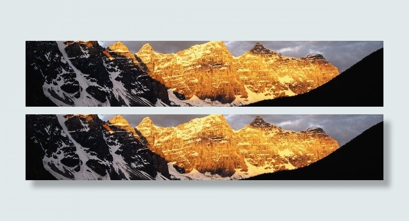 阳光下的雪山图片