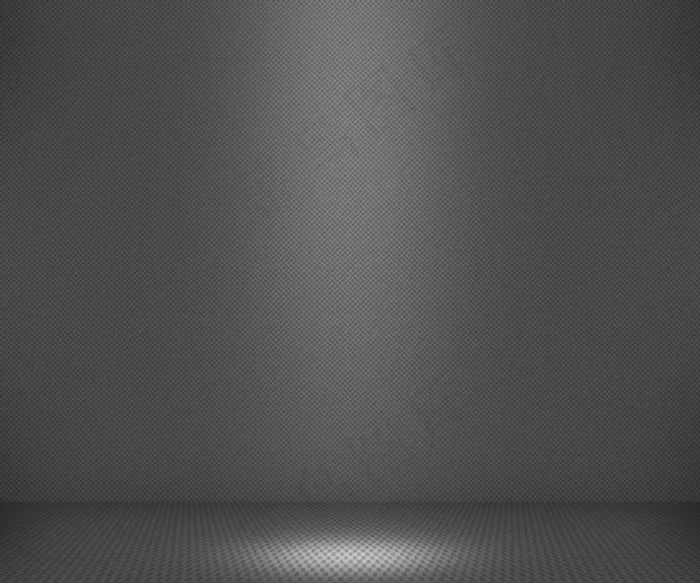 简单的聚光灯下的灰色背景