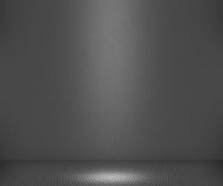 简单的聚光灯下的灰色背景