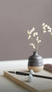 毛笔与花高清摄影图片